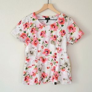 JAANUU floral peplum scrub top **size M**